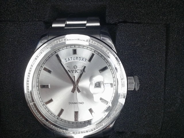 Montre quartz diamants