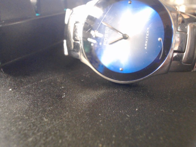 Fossil avec font bleu