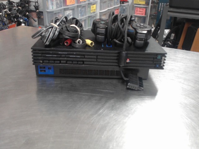 Console playstation 2+man+fils