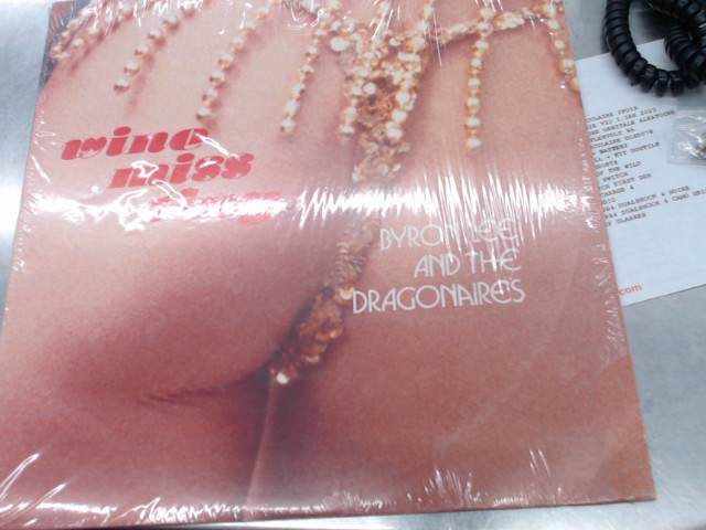 Wine miss tiny byron lee & t dragonaires