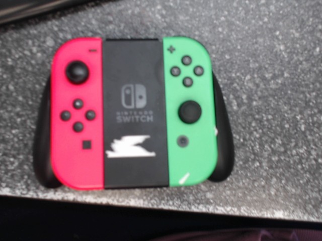 2 switch joycons + grip