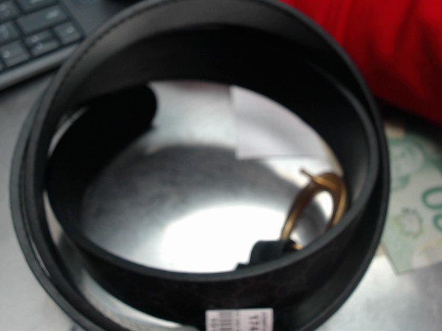 Black and gold gucci belt