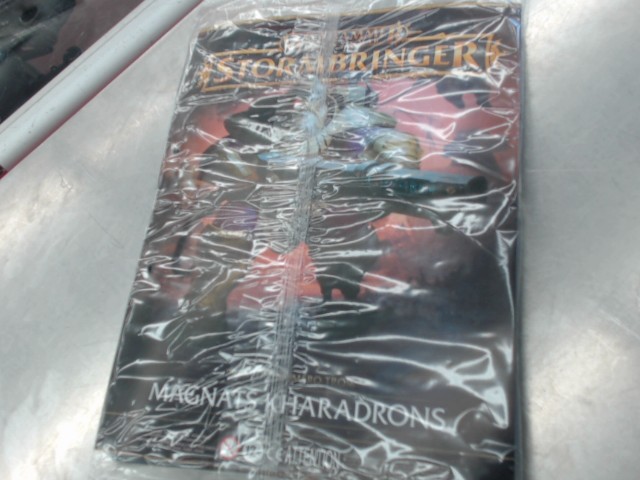 Magazine+figurine magnats khara  sceller