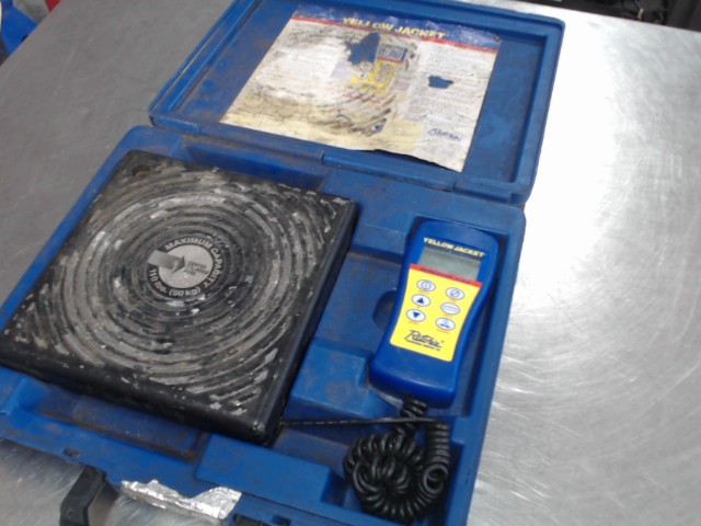 Balance de frigoriste dans case