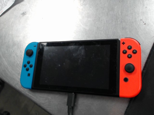 Nintendo switch avec joy-con et chargeur