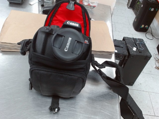 Camera photo canon avec chargeur et sac