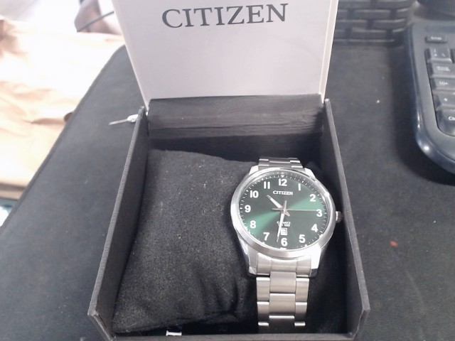 Montre citizen fond vert