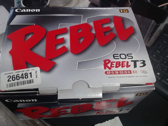 Camera in box + batt+chargeur+lentille