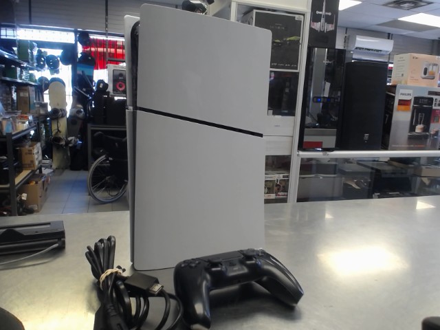 Console ps5 slim + man + fils