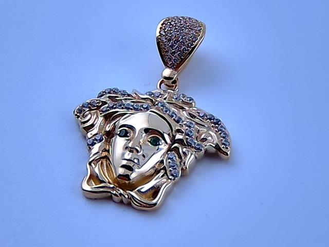 BRELOQUE EN OR 10KT NEW 