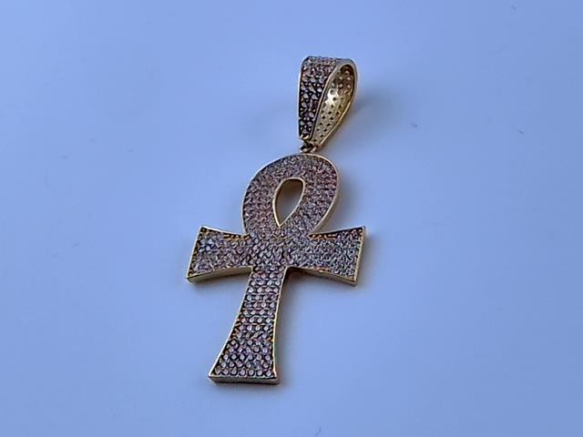 BRELOQUE EN OR 10KT NEW