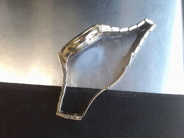 Gold watch with black dial