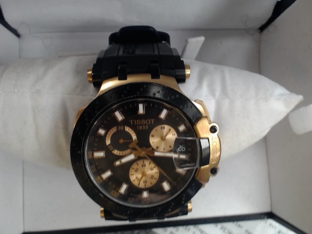 Montre tissot noire et gold avec boite