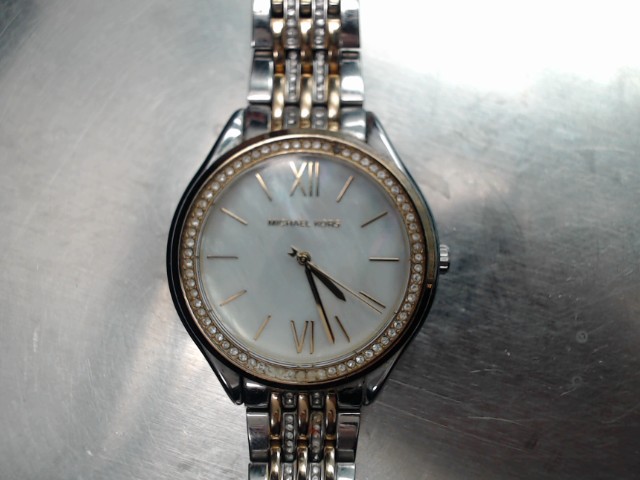 Montre gold tone avec nacre de perle