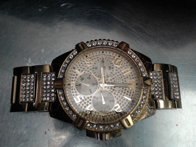 Montre gold tone avec pierres