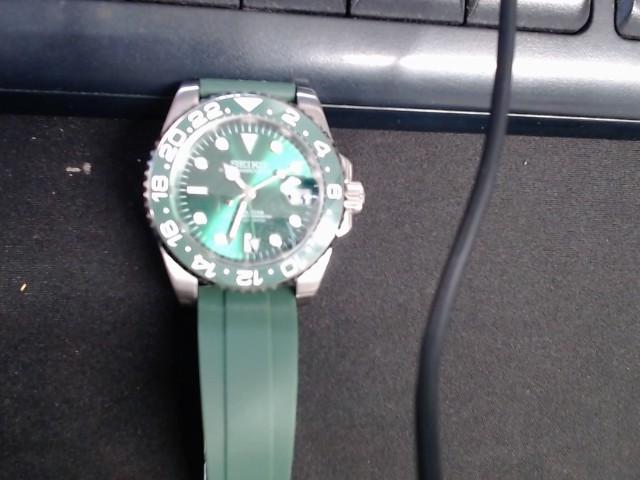 Oyster perpetual green watch
