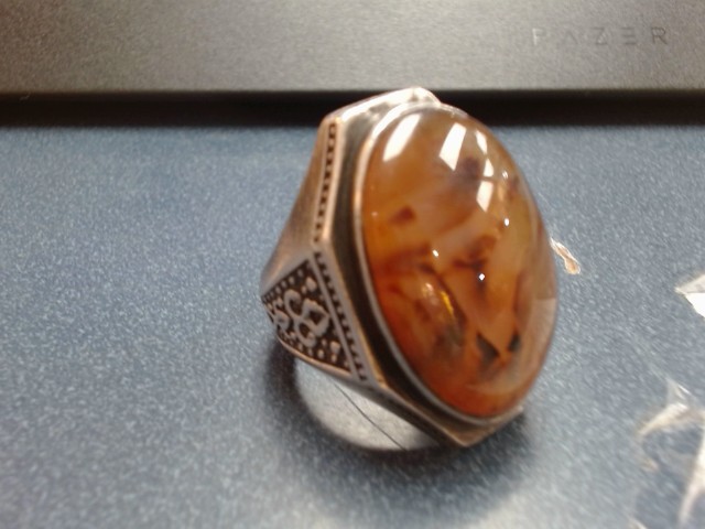 Bague argent avec tres grosse pier brun