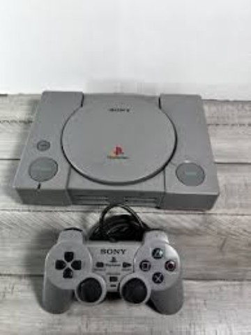 Playstation 1 grise + acc