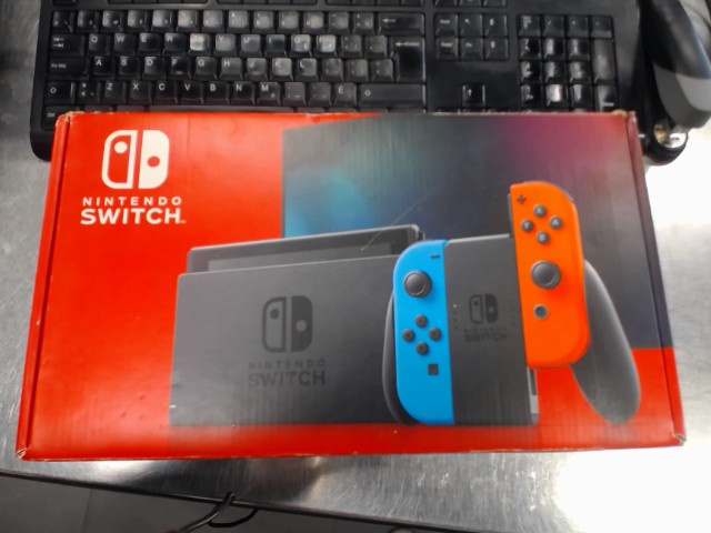 Console nintendo switch+fil+char station