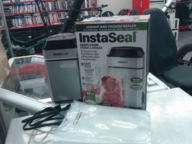 Scelleuse � sac sous vide verticale