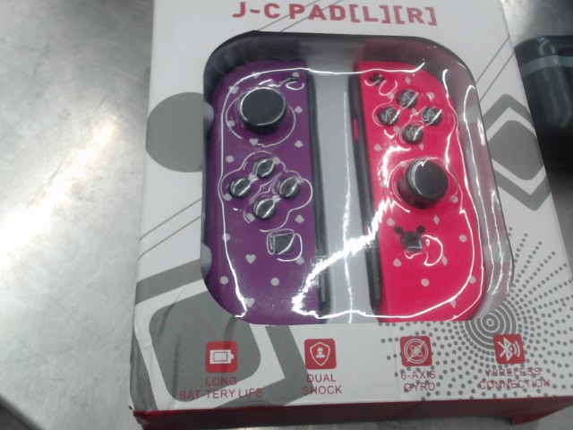 Joy-con de switch rose et mauve sealed