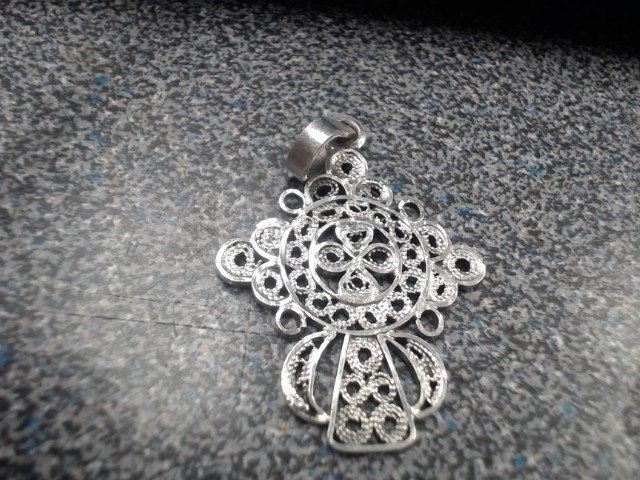 Breloque croit avec plein de motif