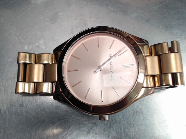 Montre rose gole micheal  kors