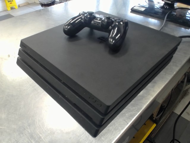 Ps4 pro + manette/fils