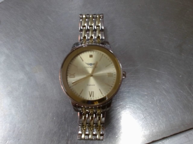 Montre gold silver gold dial