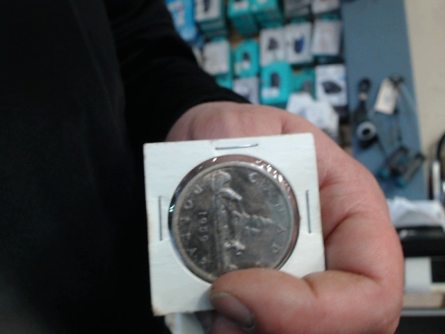 Monnaie 1959 one dollar silver