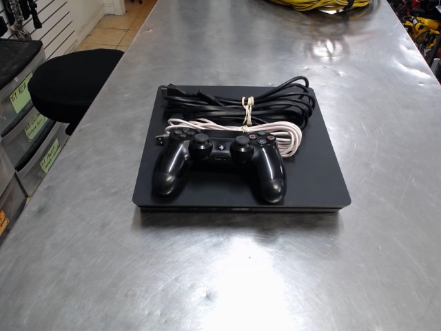 Ps4 slim 1to + man + fil