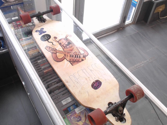 Longboard avec motif restless