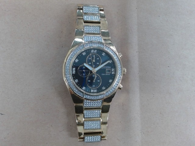 Montre citizen eco drive dore+pierres