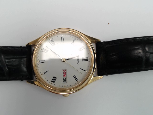 Montre seiko bracelet cuir noir gold t