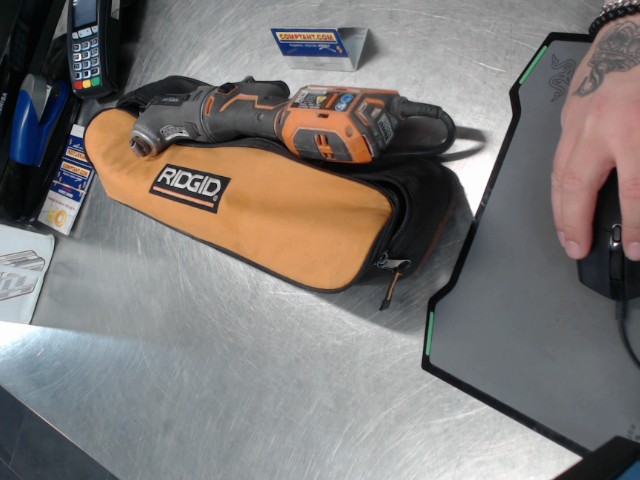 Multi tool a fil dans sac orange