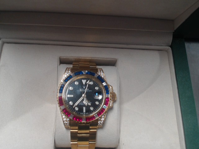 Fausse rolex dor� face noir rouge bleu