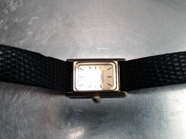 Montre femme bracelet cuir gold tone