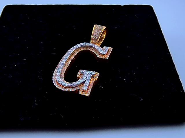 BRELOQUE EN OR 10KT AVEC DIAMANTS
