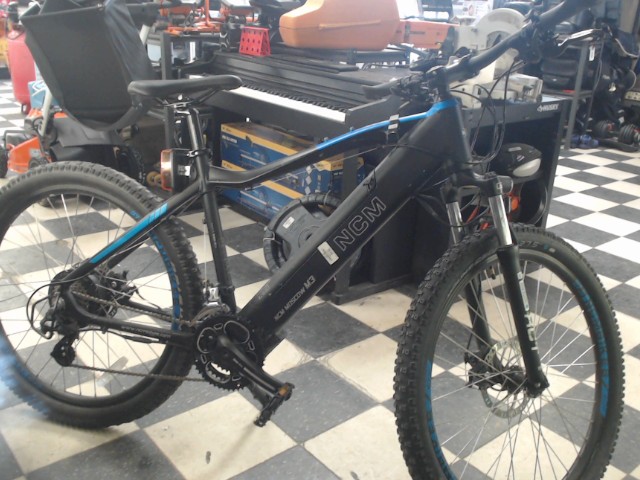Velo elect+charger dev caisse acc95