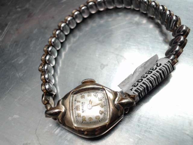 Montre vintage gold tone