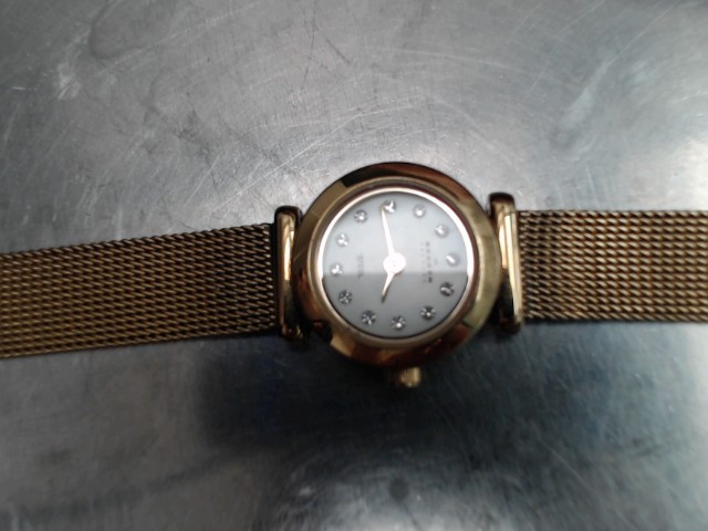 Montre gold tone femme petite