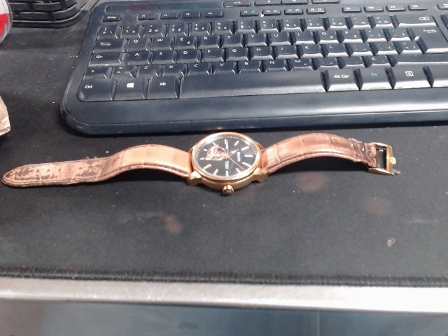 Automatic bulova+monture en cuir