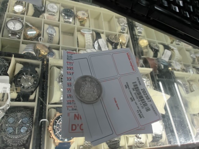 Monnaie canadienne 1965 50c bon etat