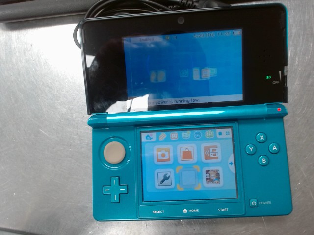 Console 3ds avec fil dans sac