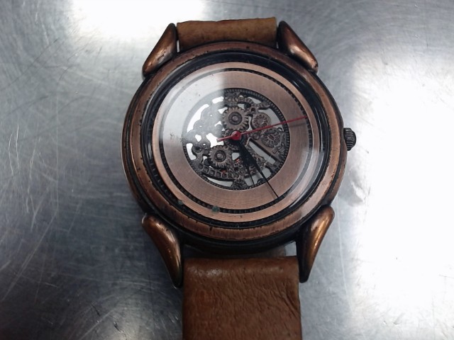 Montre quartz bronze