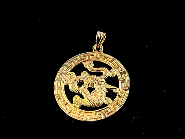 BRELOQUE EN OR 18KT