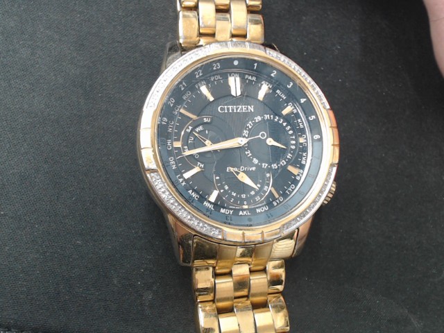 Montre citizen gold avec diamant