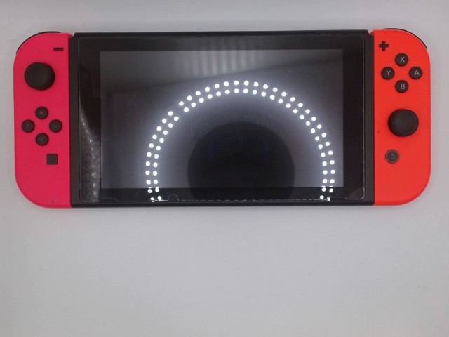 Nintendo switch avec chargeur et case