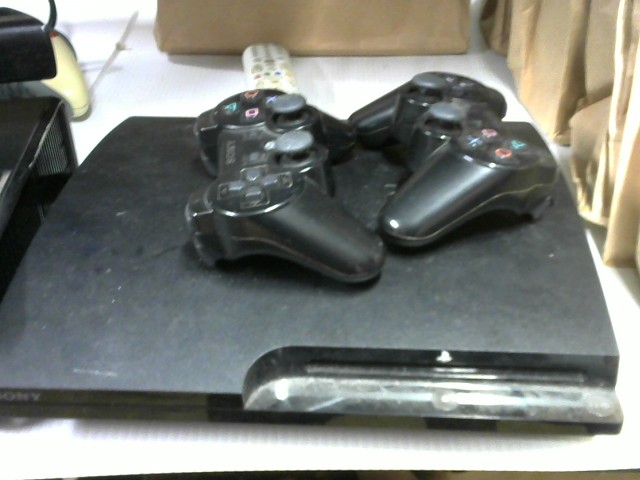 Ps3 slim console 2 man + fils