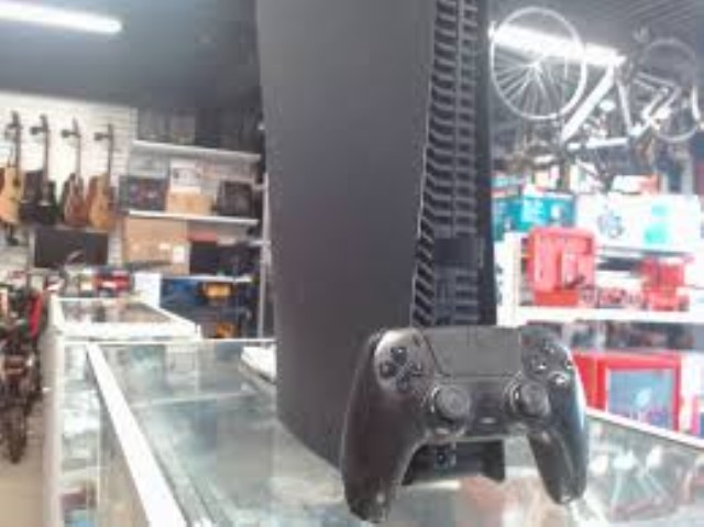 Ps5 noire avec manette fils